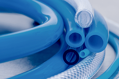 Several rubber hoses lie on top of each other in different structures